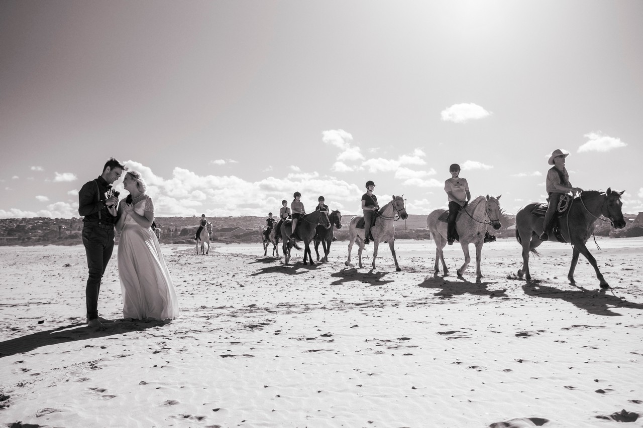 Jeffreys Bay wedding photographer — beach ceremony candid moment by Tim Moolman, Eastern Cape